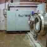 Laundry facility utilizing the PIRANHA Wastewater Heat Recovery & Cooling System